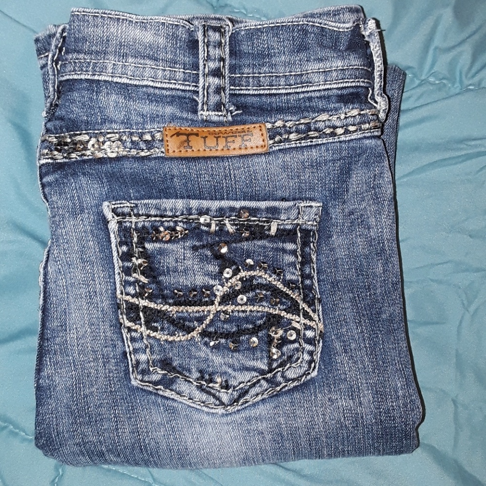 Cowgirl Tuff jeans.